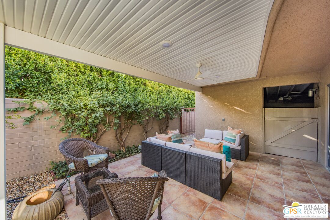 73940 Mountain View Avenue Palm Desert, CA 92260 - Photo 19 of 52 a outdoor living space with furniture and garden view