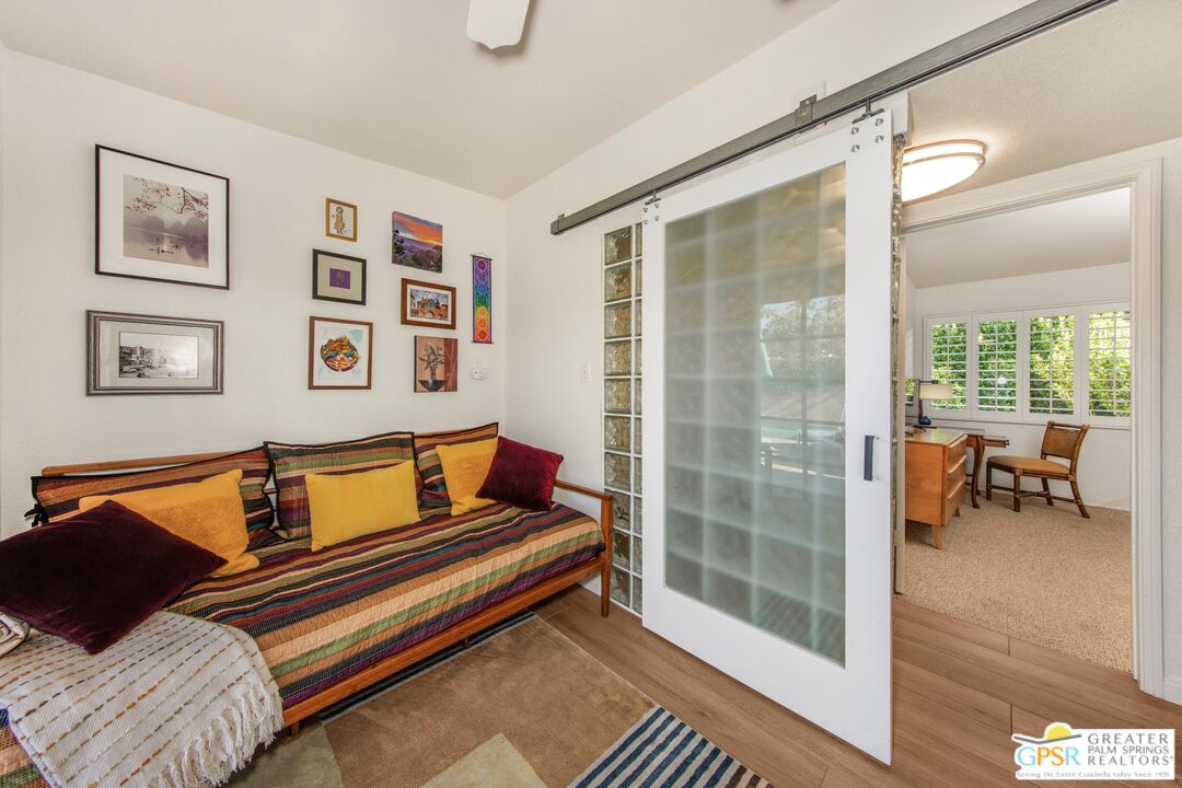73940 Mountain View Avenue Palm Desert, CA 92260 - Photo 36 of 52 a outdoor living space with a couch and next to a window