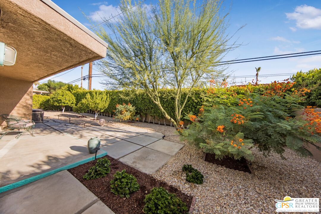 73940 Mountain View Avenue Palm Desert, CA 92260 - Photo 37 of 52 a view of a pathway both side of a building