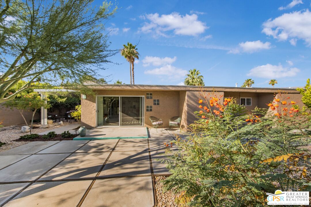 73940 Mountain View Avenue Palm Desert, CA 92260 - Photo 40 of 52 a view of a house with a window and sitting area