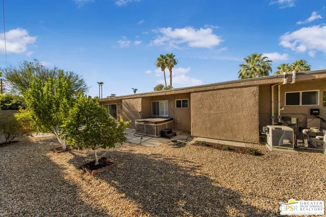 a view of a backyard of a house