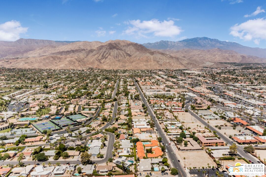73940 Mountain View Avenue Palm Desert, CA 92260 - Photo 50 of 52 an aerial view of residential houses with outdoor space