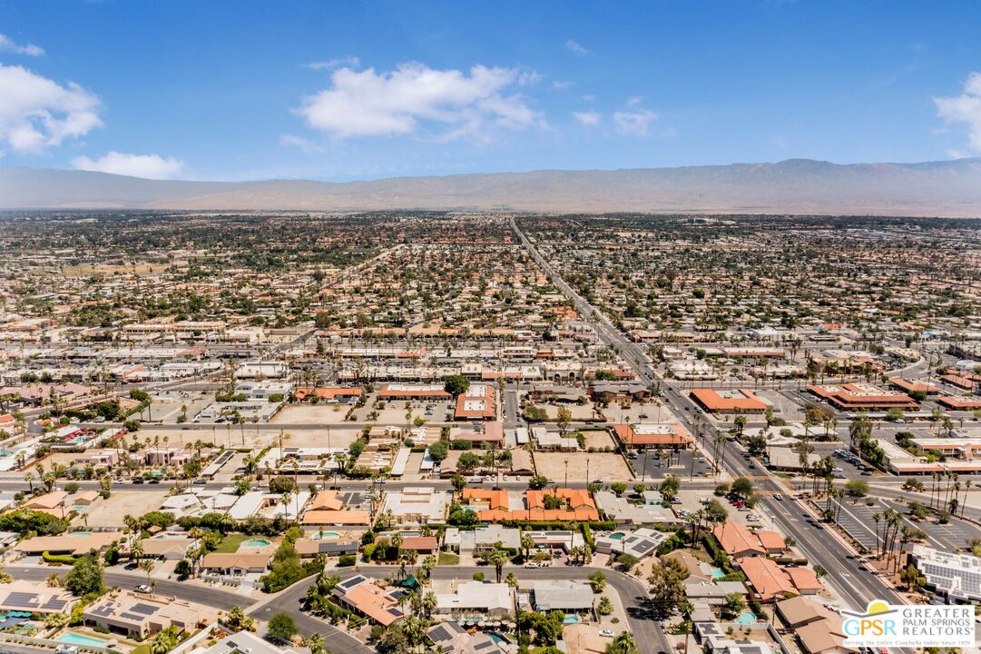 73940 Mountain View Avenue Palm Desert, CA 92260 - Photo 51 of 52 an aerial view of residential building with parking space