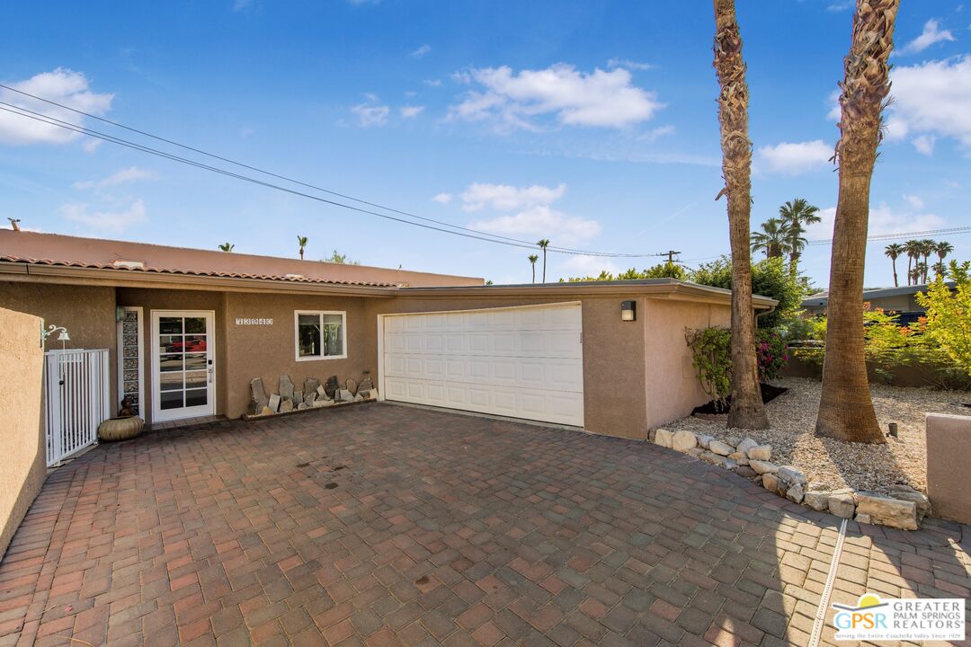 73940 Mountain View Avenue Palm Desert, CA 92260 - Photo 7 of 52 a view of a house with a patio