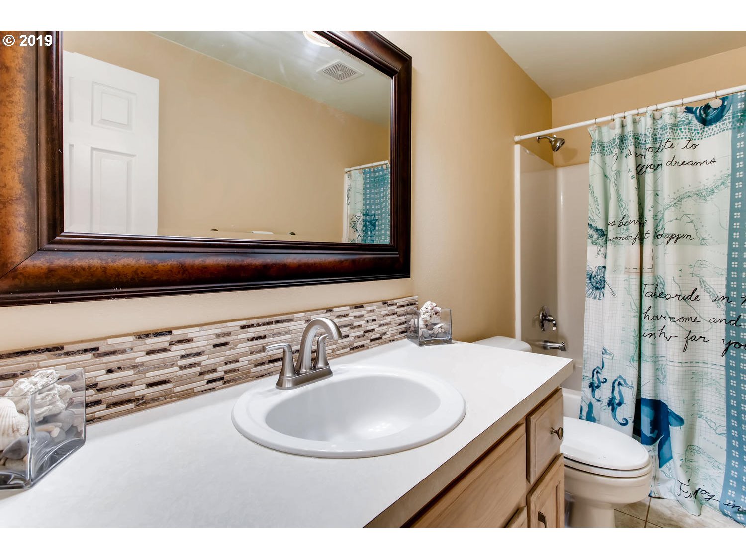 11578 Parrish Road Oregon City, OR 97045 - Photo 17 of 22 a bathroom with a sink and a mirror