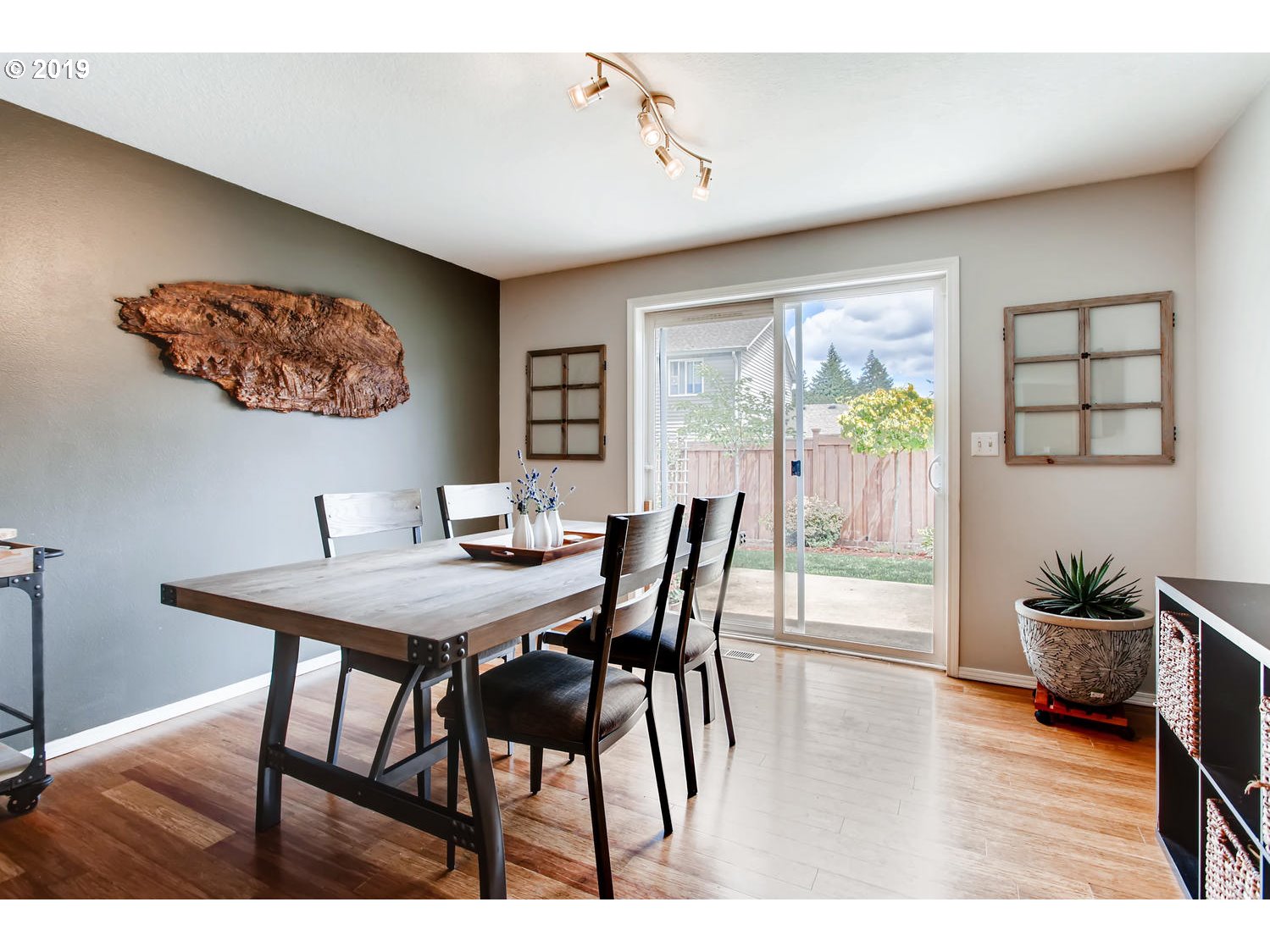 11578 Parrish Road Oregon City, OR 97045 - Photo 9 of 22 a view of a dining room with furniture window and wooden floor