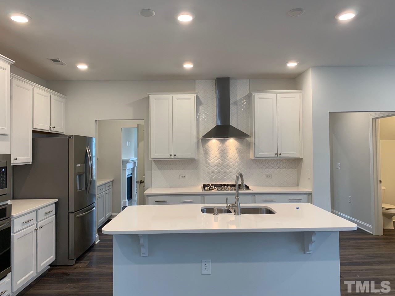 5217 Influence Way, Unit 2180 Raleigh, NC 27616 - Photo 17 of 26 photos not of actual home, photos provided as example of same floorplan layout and interior selections for the home in this listing.