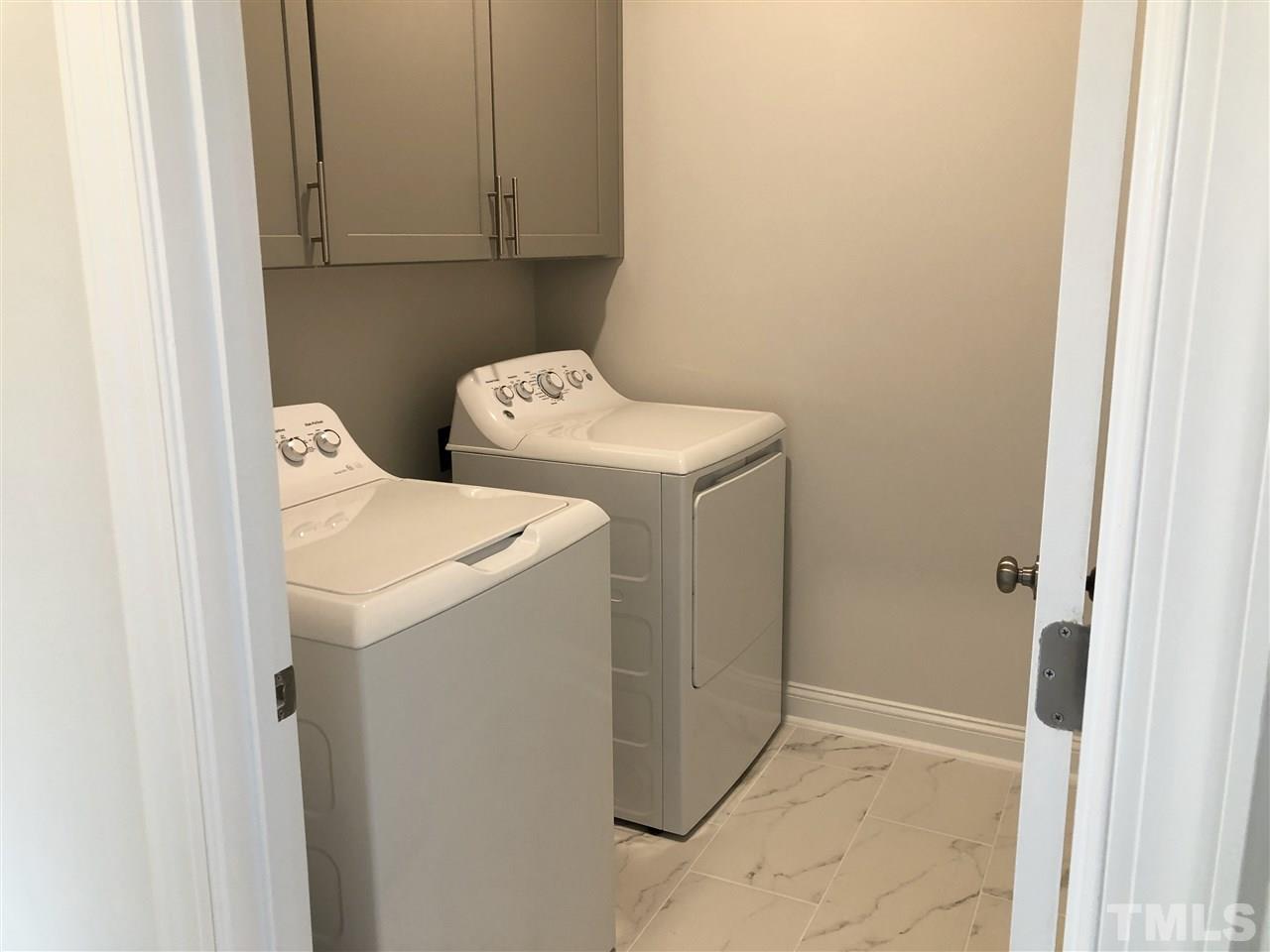 5217 Influence Way, Unit 2180 Raleigh, NC 27616 - Photo 20 of 26 photos not of actual home, photos provided as example of same floorplan layout, appliances & cabinets in laundry are not included in this listing