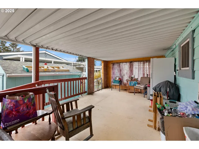 a view of a porch with furniture
