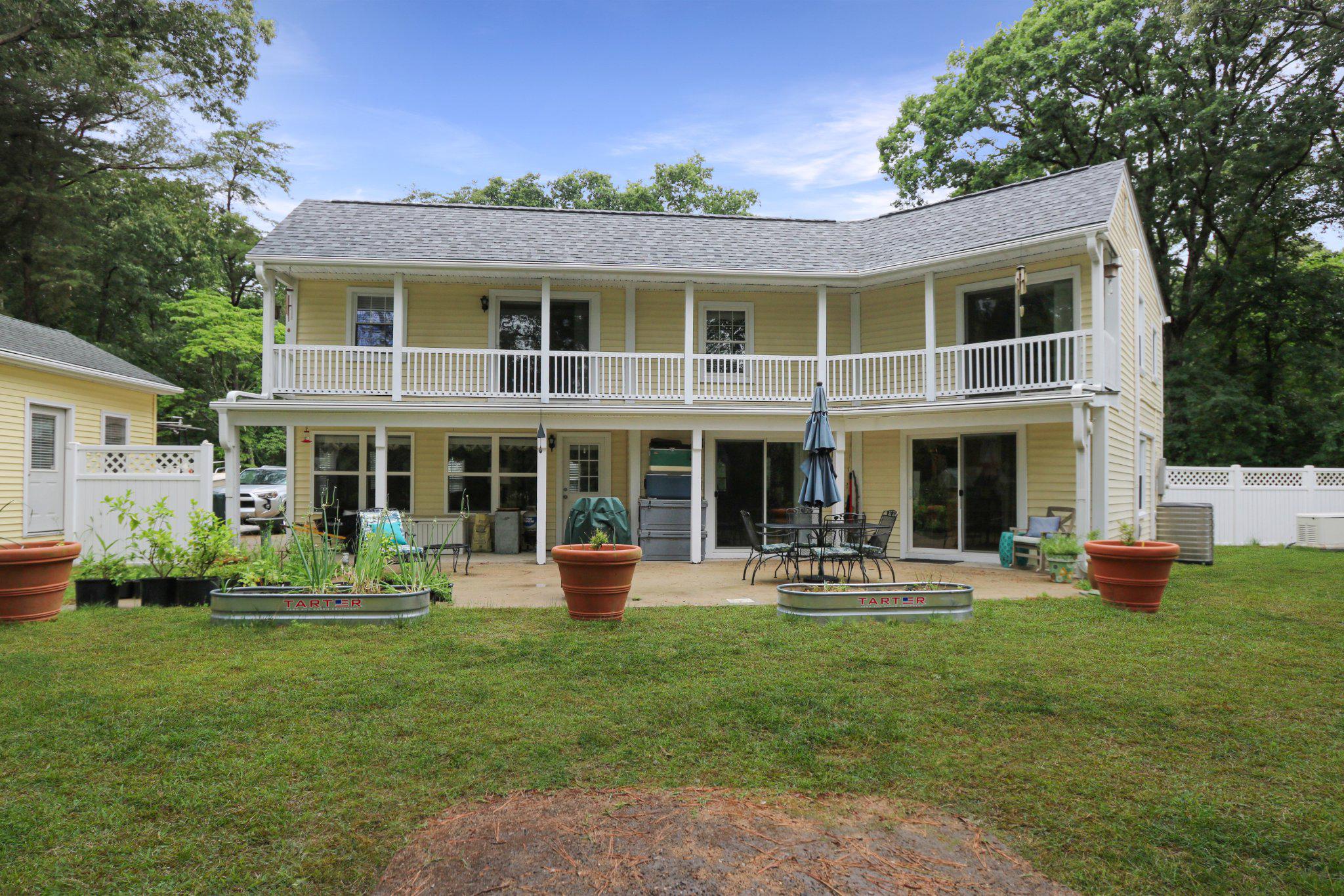 13431 Solitude Trail Machipongo, VA 23405 - Photo 18 of 32 Charming two-story home with patio.