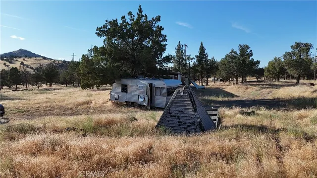 a view of a town with trees
