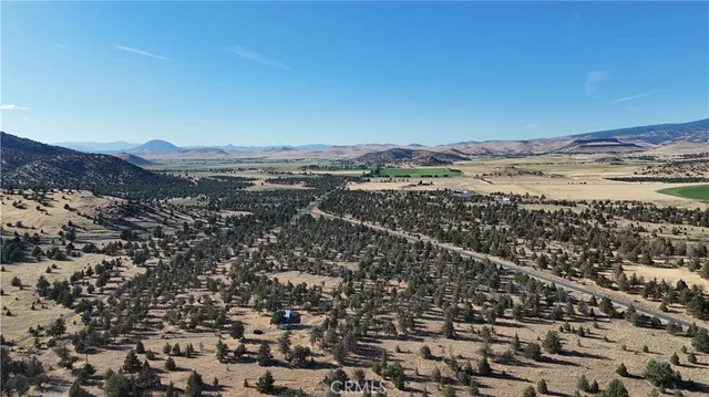 an aerial view of mountain with beach