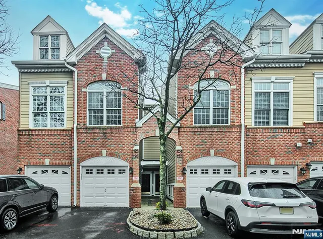 a view of a swimming pool with lounge chairs