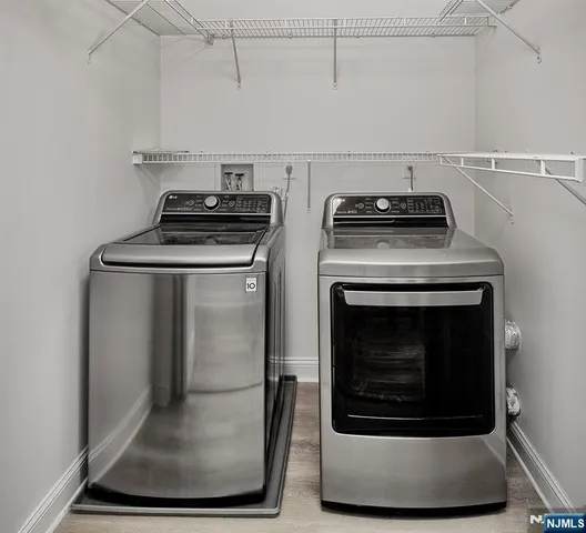 a stove top oven sitting inside of a kitchen