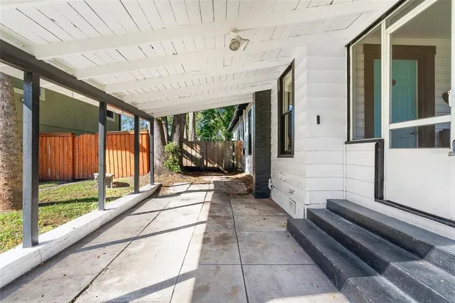 a view of a porch with a backyard