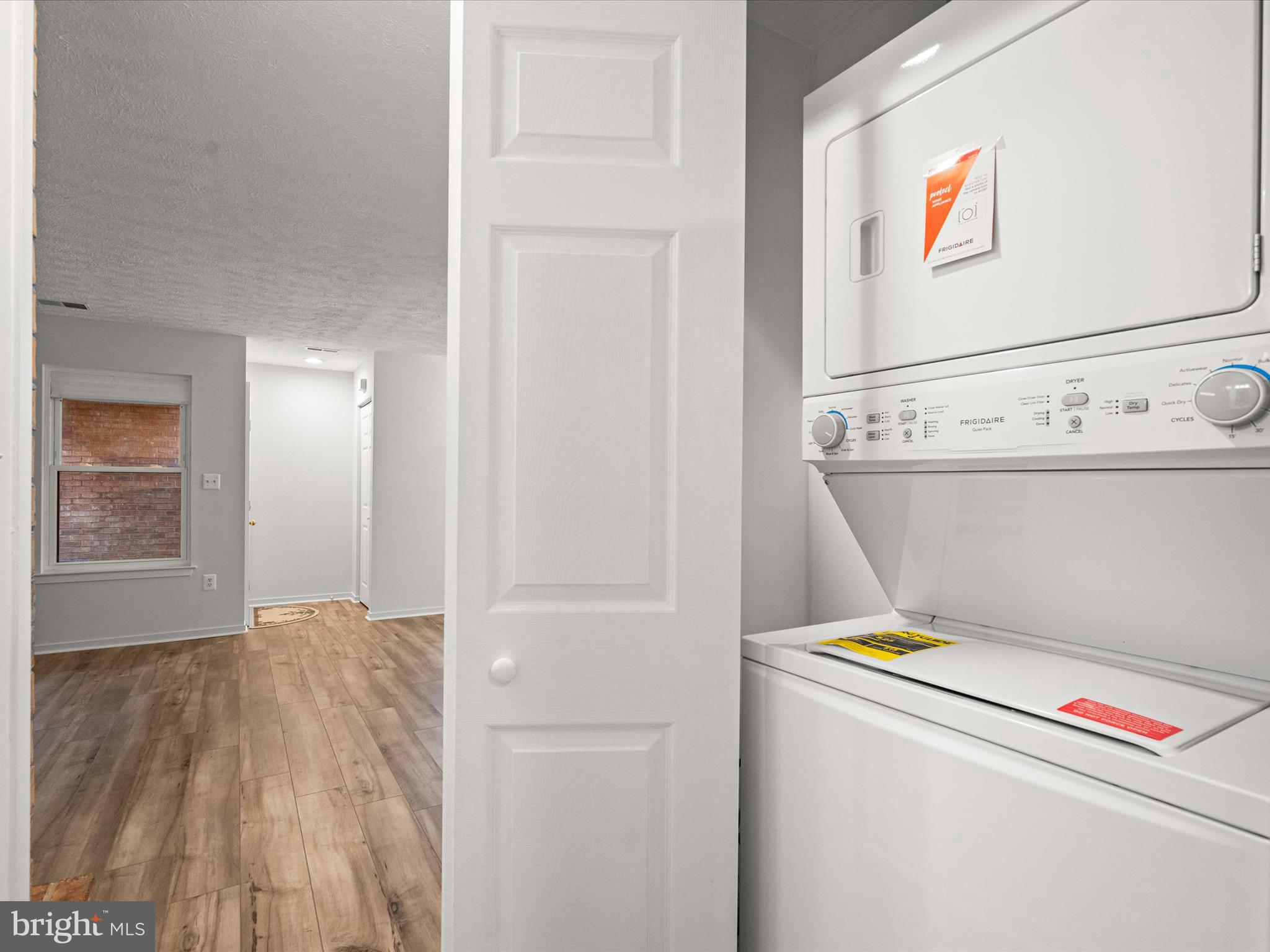 7607 Weather Worn Way, Unit A Columbia, MD 21046 - Photo 21 of 36 a utility room with dryer and washer