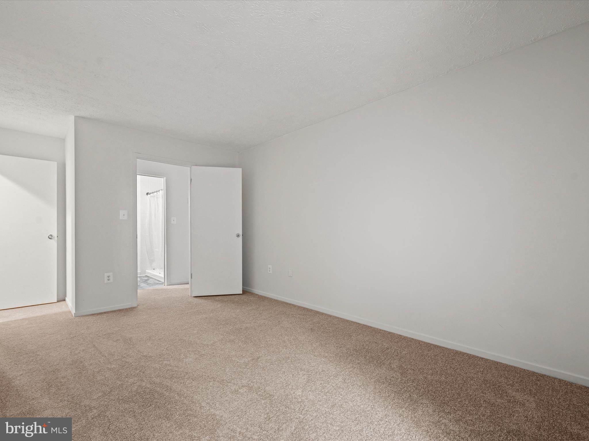 7607 Weather Worn Way, Unit A Columbia, MD 21046 - Photo 25 of 36 a view of an empty room and closet area