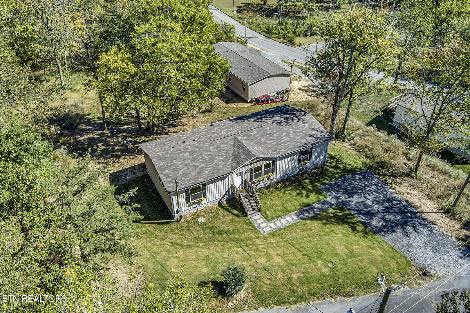 722 Posey Road Etowah, TN 37331 - Photo 4 of 52 04_PoseyRoad_722_FrontLeftElevated