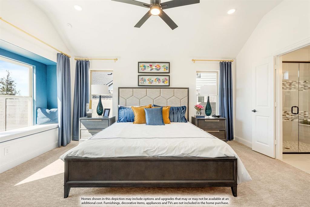 2014 Dundalk Lane Forney, TX 75126 - Photo 19 of 38 a bedroom with a large bed and a chandelier