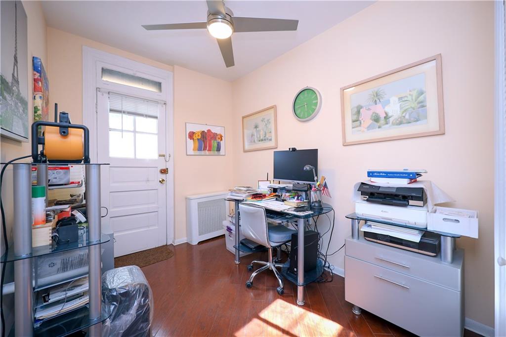 578 Ovington Avenue Brooklyn, NY 11209 - Photo 14 of 40 a view of a workspace with furniture and a window