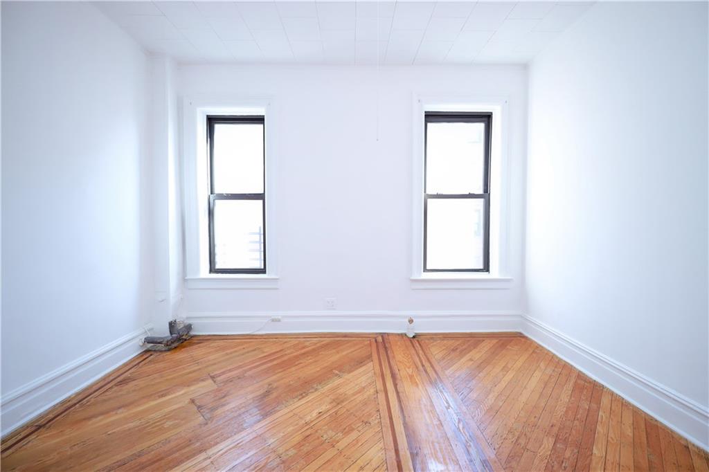 578 Ovington Avenue Brooklyn, NY 11209 - Photo 21 of 40 an empty room with a window