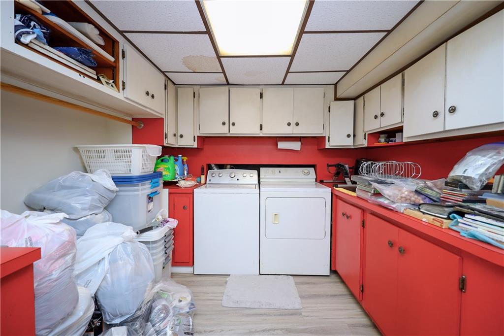 578 Ovington Avenue Brooklyn, NY 11209 - Photo 28 of 40 a kitchen with stainless steel appliances granite countertop a sink and cabinets