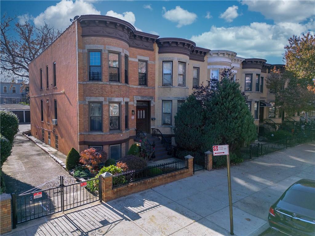 578 Ovington Avenue Brooklyn, NY 11209 - Photo 32 of 40 a front view of a building with garden