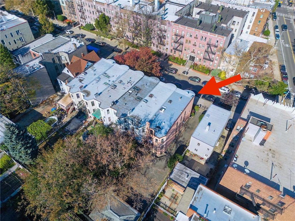 578 Ovington Avenue Brooklyn, NY 11209 - Photo 38 of 40 an aerial view of a house with a yard