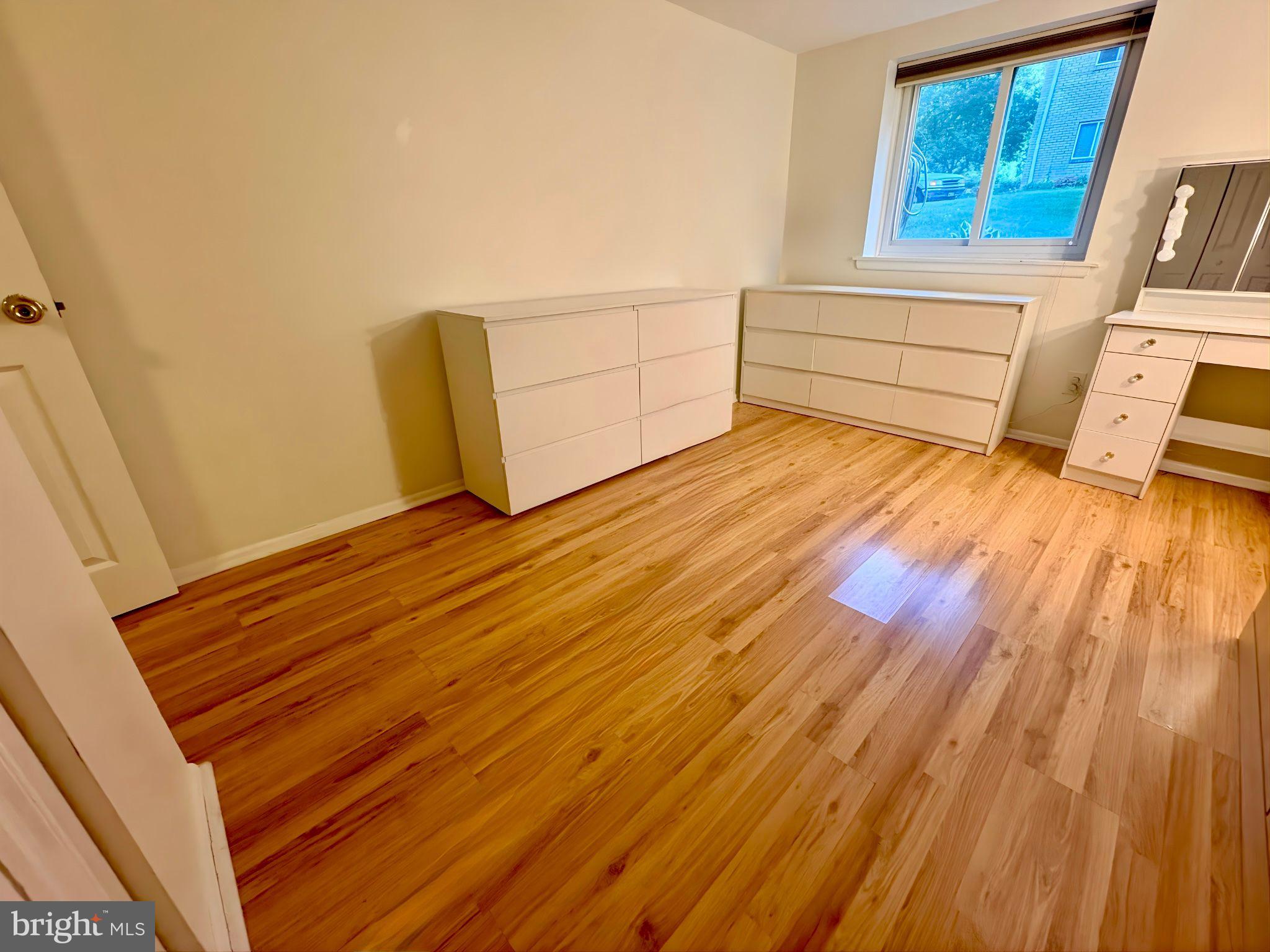 7 Rockford Road, Unit F1 Wilmington, DE 19806 - Photo 9 of 16 a view of a room with wooden floor and small space