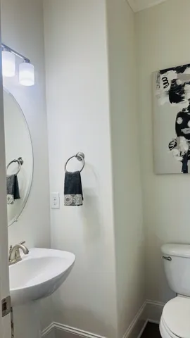 a bathroom with a sink double vanity granite tub shower and a mirror