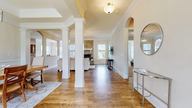 a view of a livingroom with furniture and wooden floor