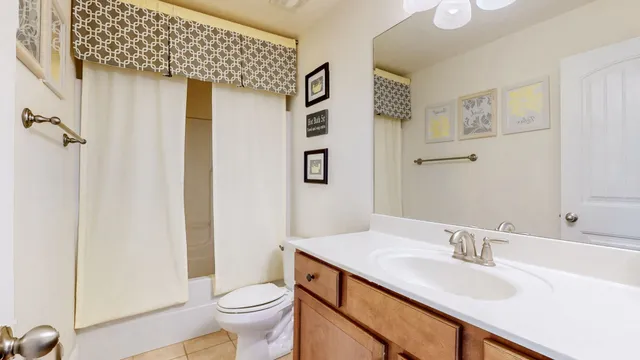 a view of two chairs in the balcony