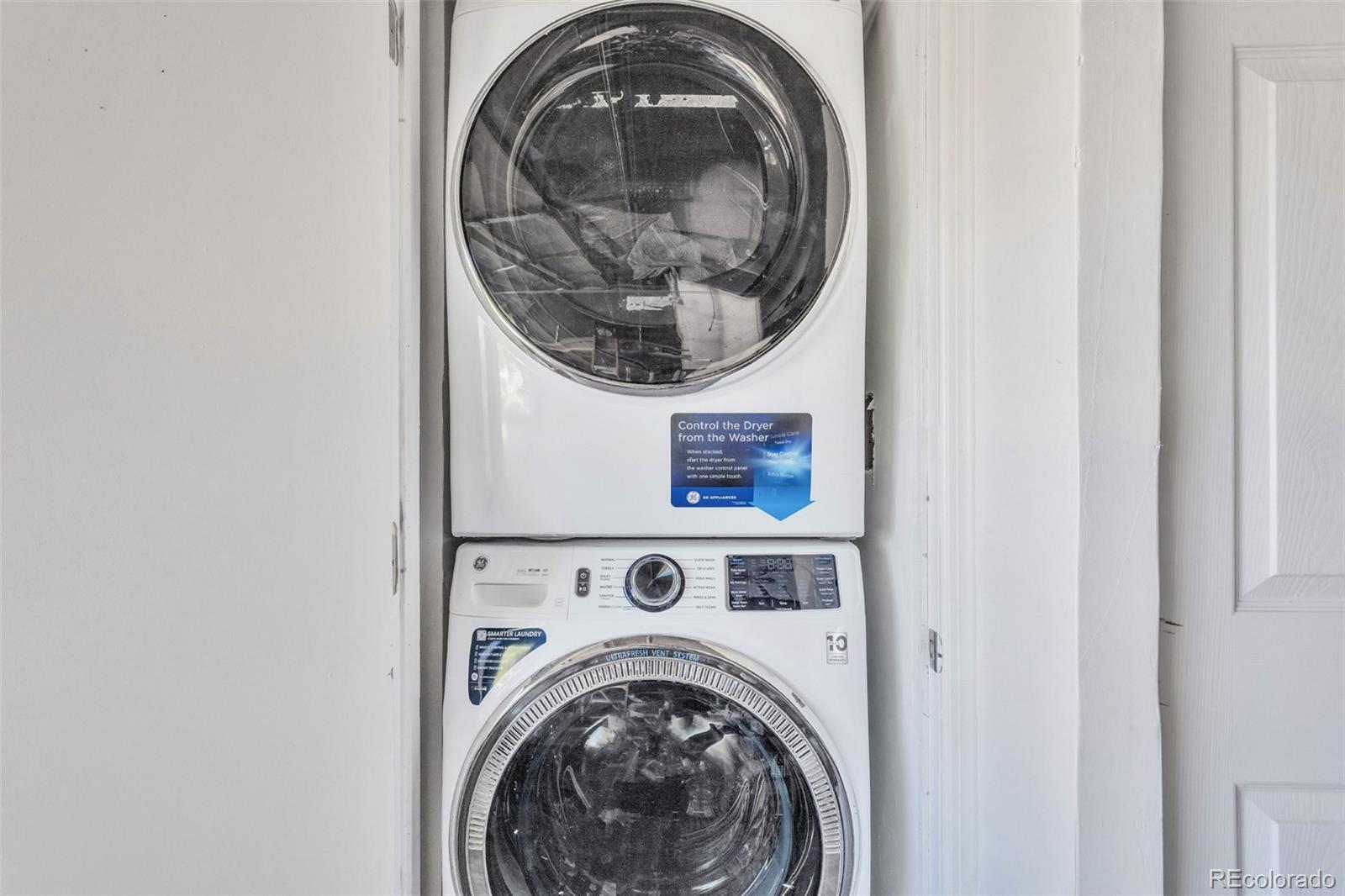 2645 South Danube Way Aurora, CO 80013 - Photo 11 of 24 a utility room with dryer and washer