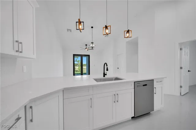 a utility room with cabinets