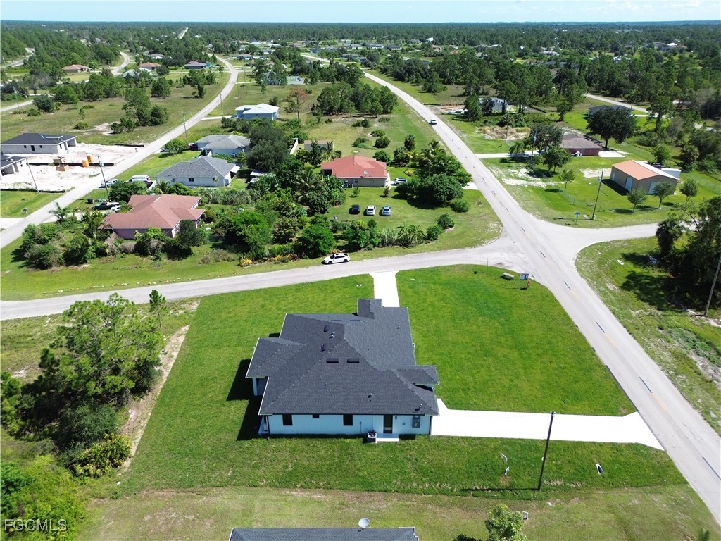 1112 Eisenhower Boulevard Lehigh Acres, FL 33974 - Photo 31 of 35 an aerial view of a