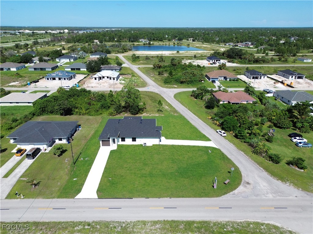 1112 Eisenhower Boulevard Lehigh Acres, FL 33974 - Photo 34 of 35 an aerial view of a