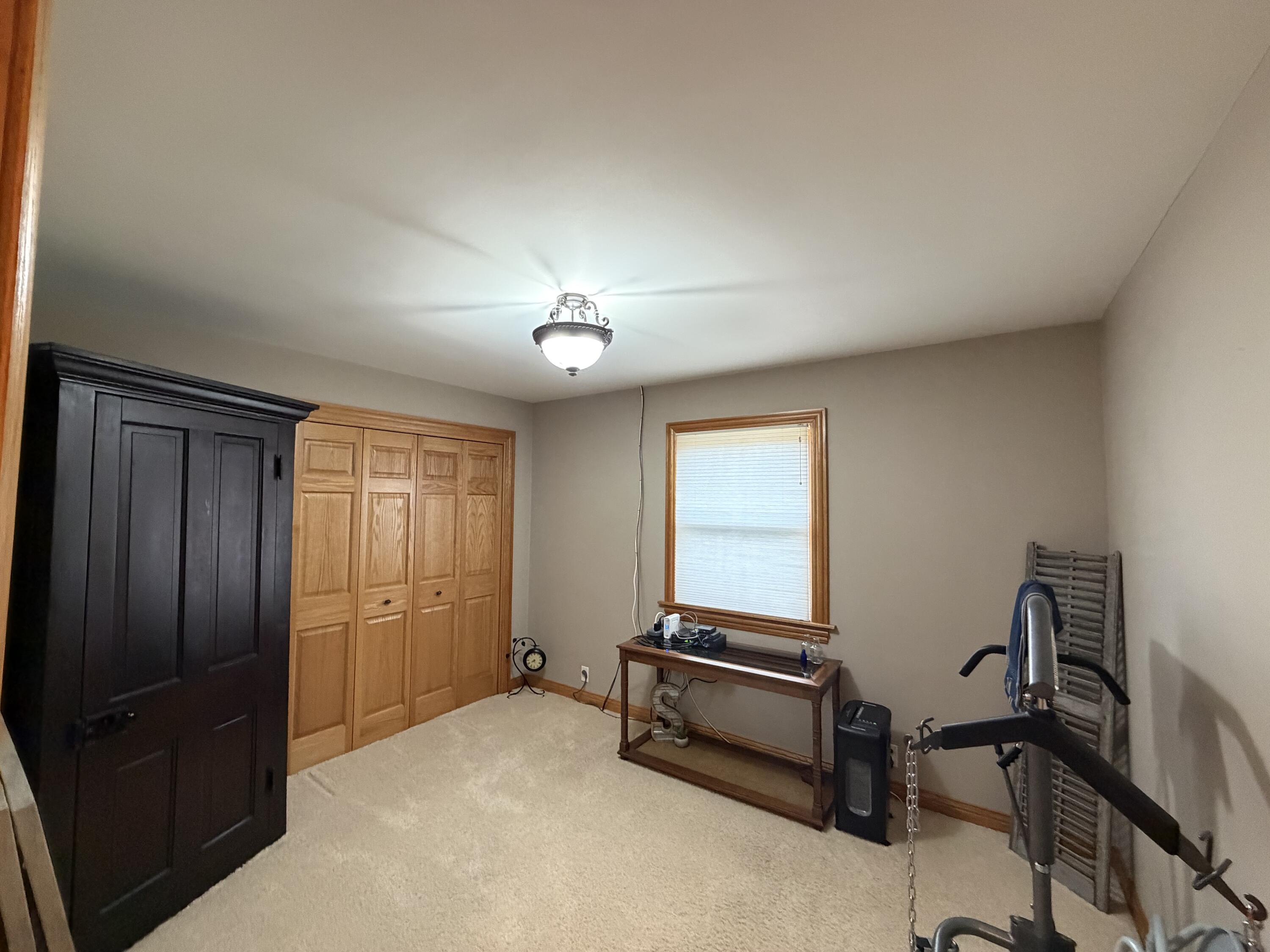 1245 West Mt Calvary Road Rensselaer, IN 47978 - Photo 22 of 35 a view of a room with gym equipment