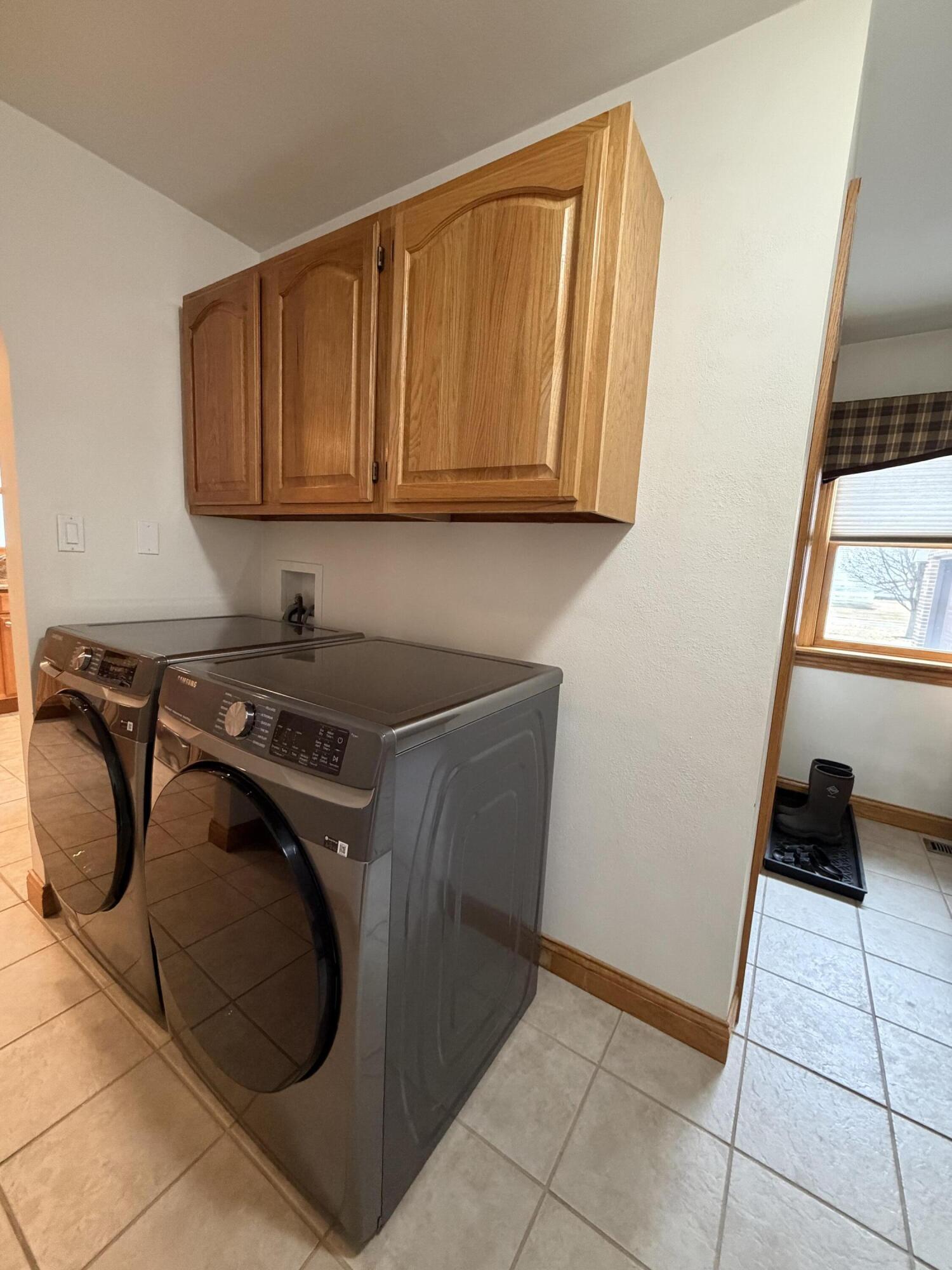 1245 West Mt Calvary Road Rensselaer, IN 47978 - Photo 25 of 35 a utility room with dryer and washer
