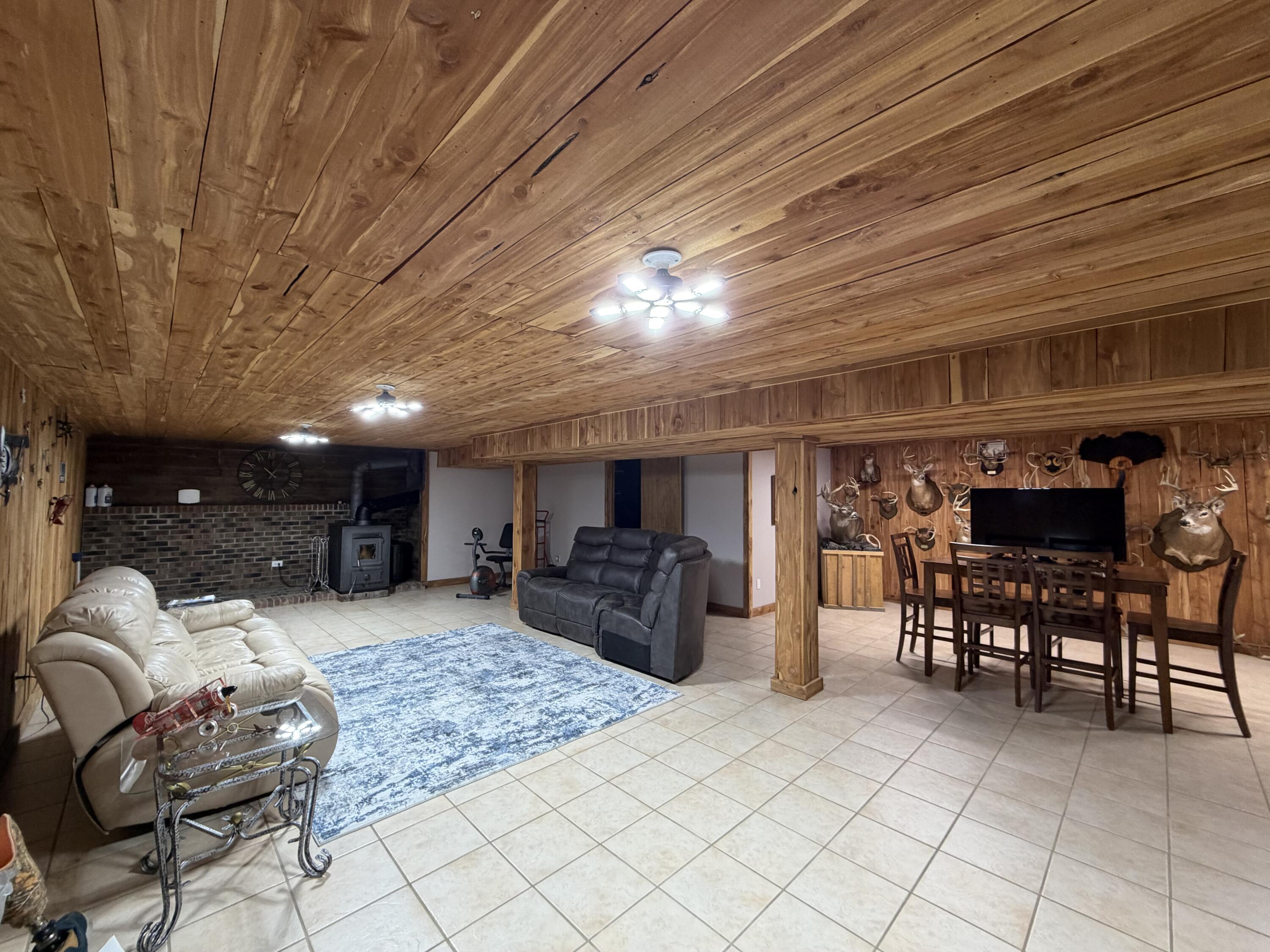 1245 West Mt Calvary Road Rensselaer, IN 47978 - Photo 29 of 35 a living room with furniture and a flat screen tv