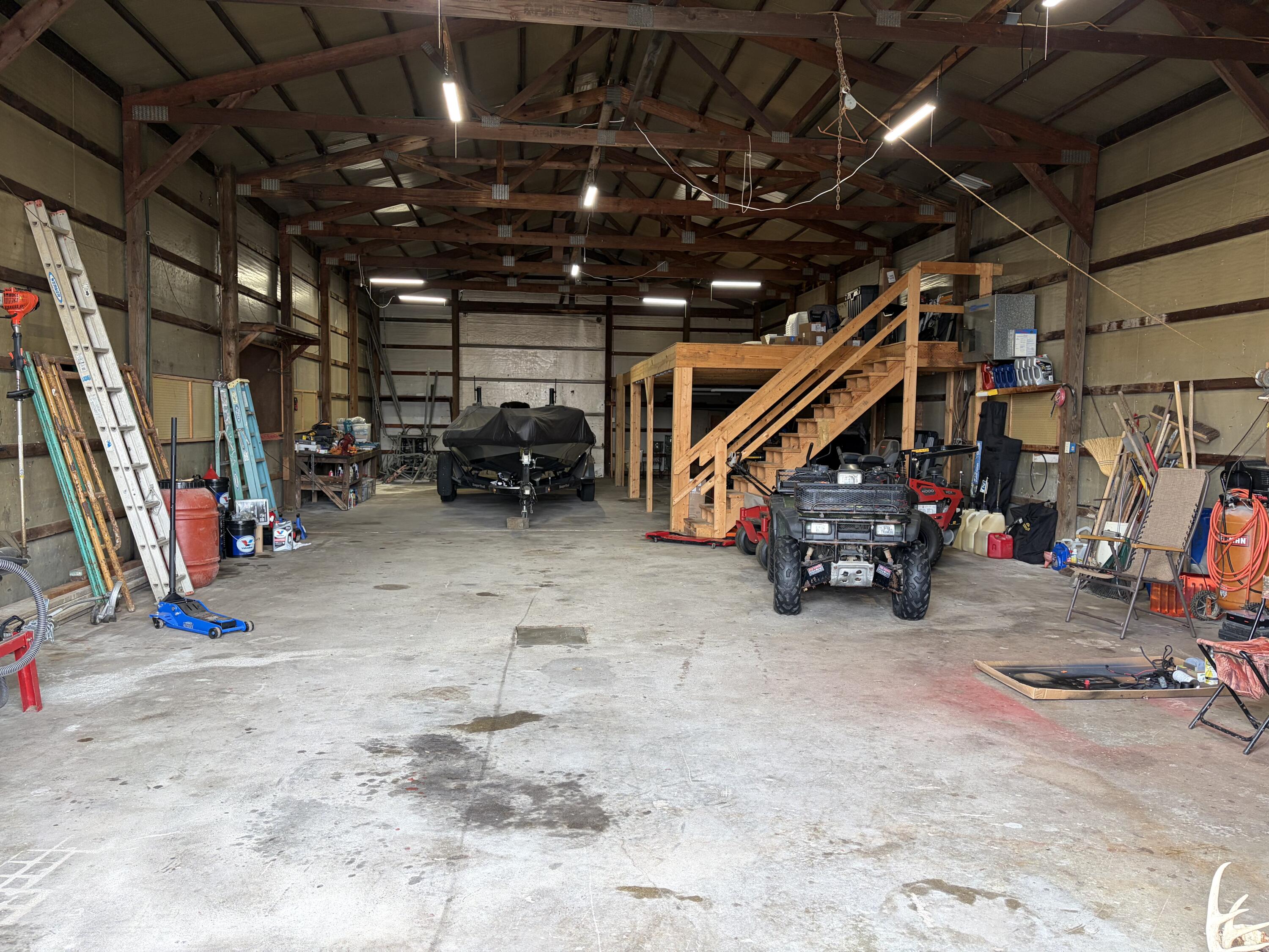 1245 West Mt Calvary Road Rensselaer, IN 47978 - Photo 33 of 35 a view of a garage with a bike and car