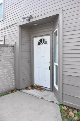 a view of a front door and a window