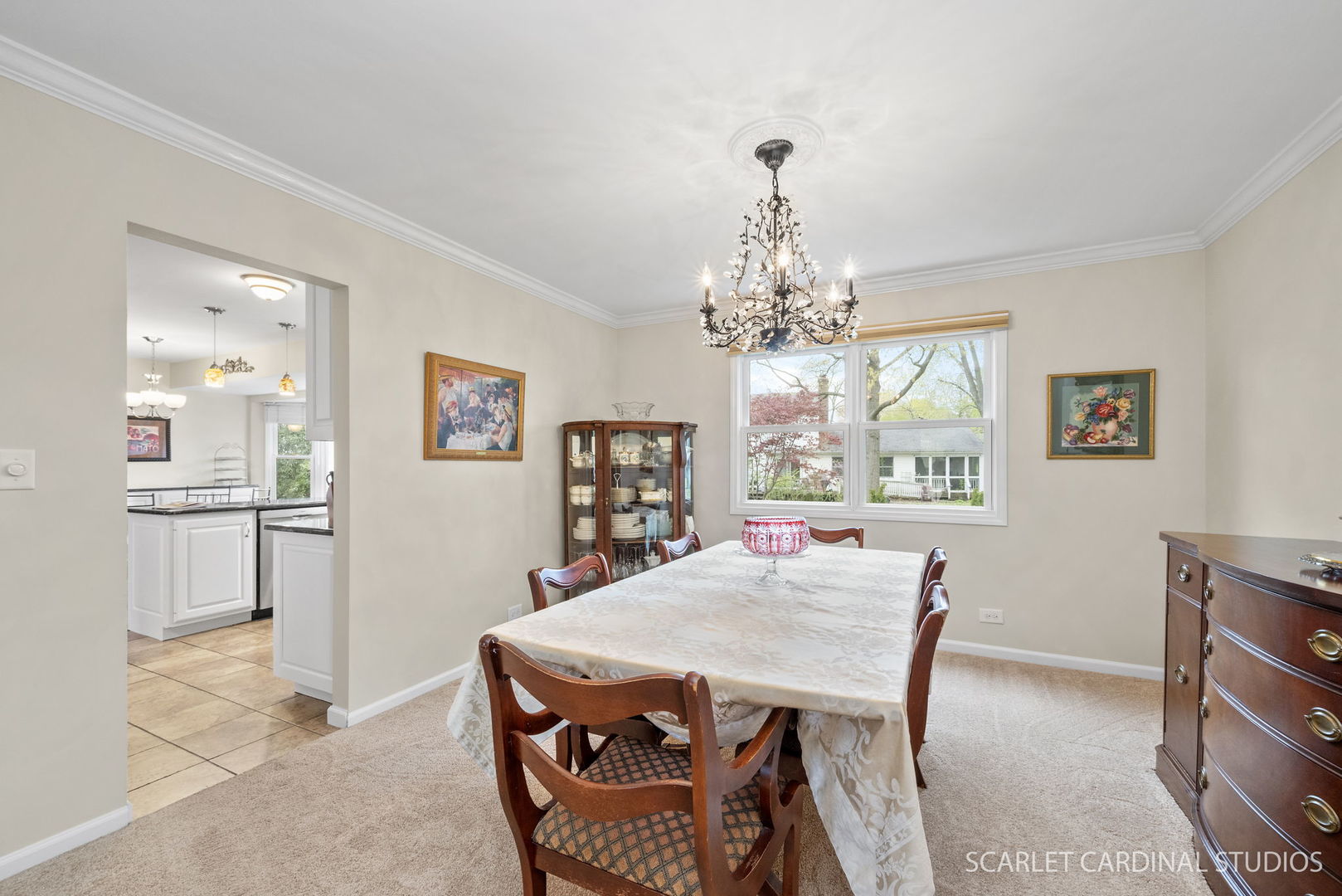 188 Hamilton Lane Wheaton, IL 60189 - Photo 12 of 34 a view of a dining room with furniture and a chandelier