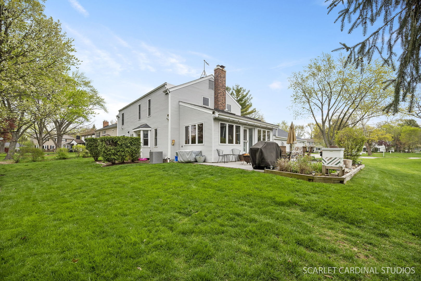 188 Hamilton Lane Wheaton, IL 60189 - Photo 2 of 34 a view of a house with backyard and sitting area