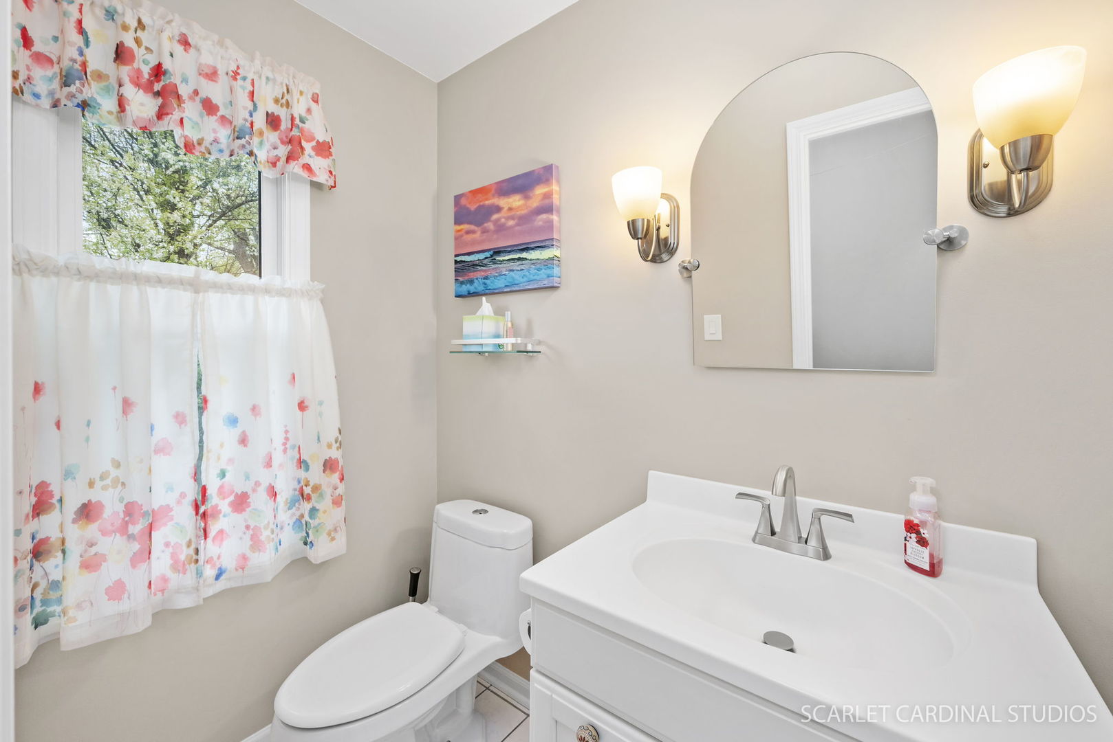188 Hamilton Lane Wheaton, IL 60189 - Photo 22 of 34 a white toilet sitting next to a bathroom sink
