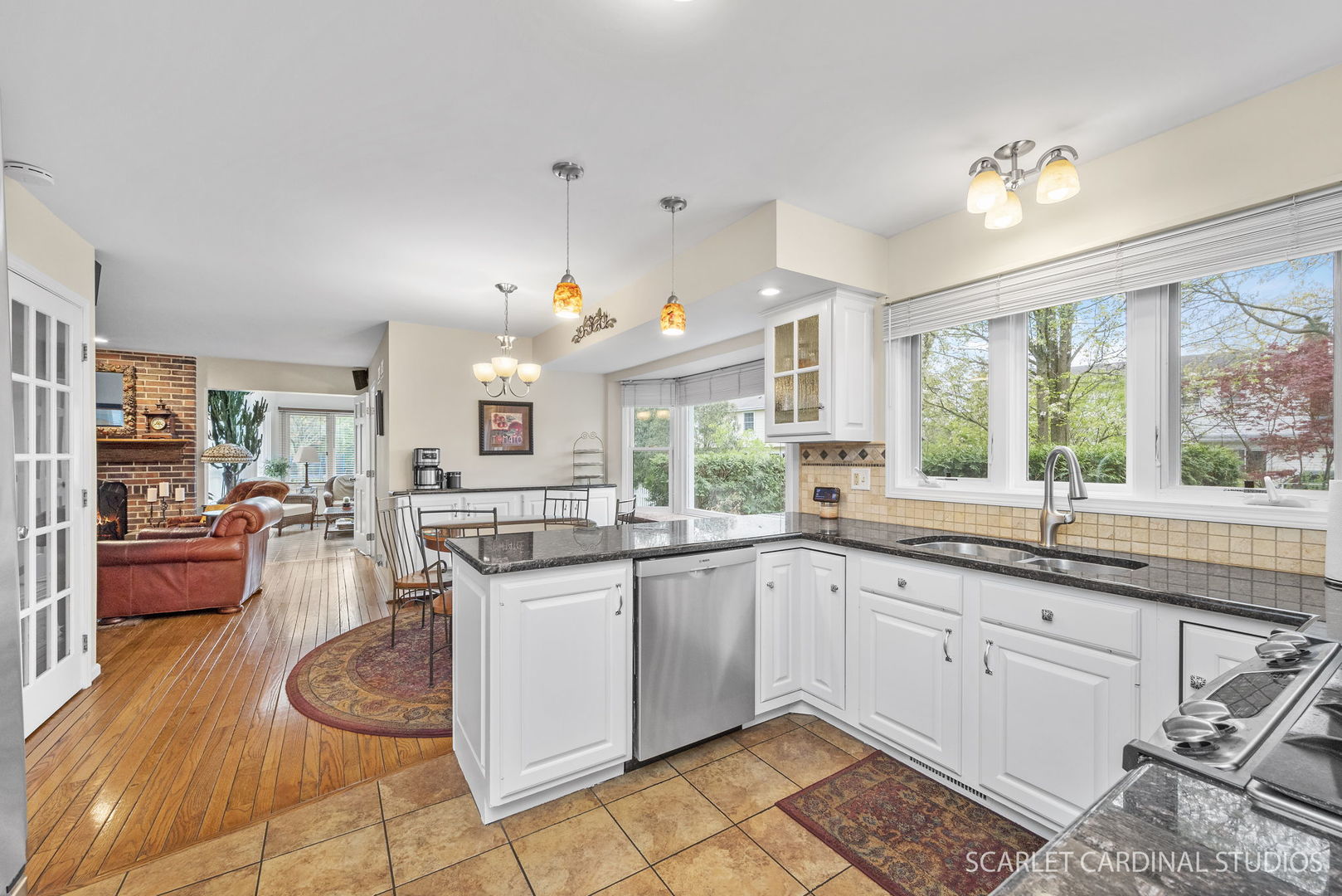 188 Hamilton Lane Wheaton, IL 60189 - Photo 5 of 34 a kitchen with a sink stove and cabinets