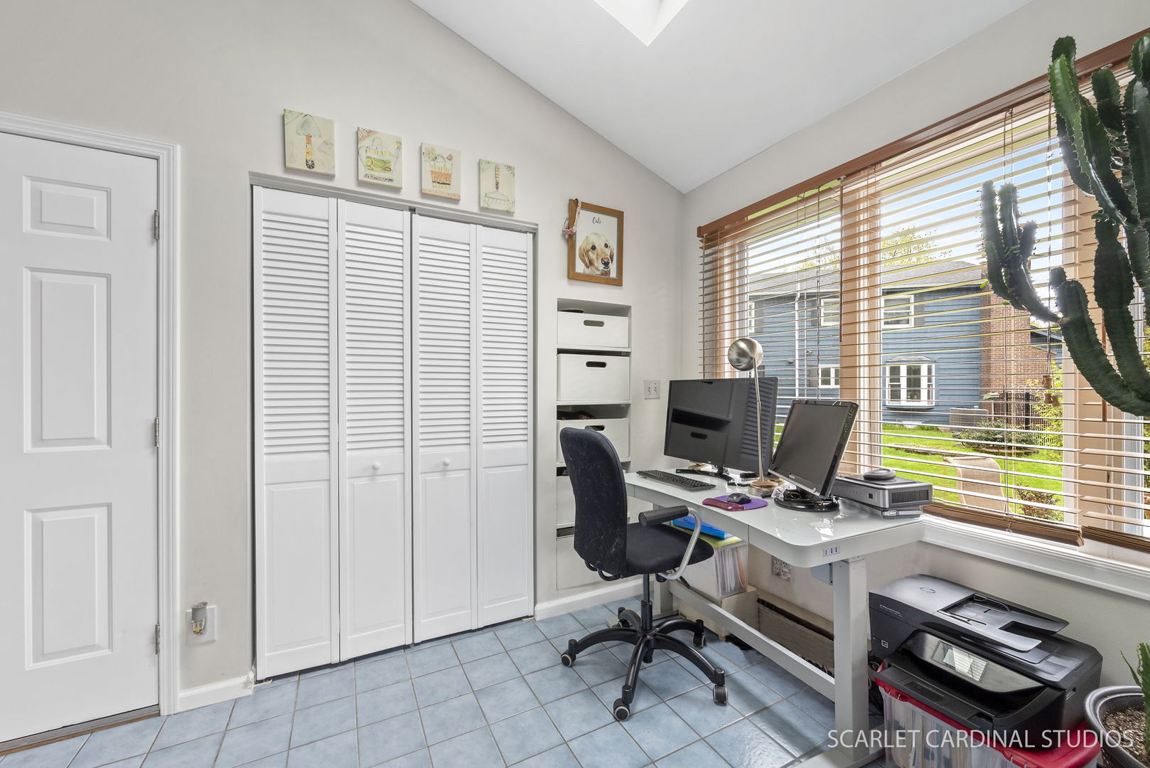 188 Hamilton Lane Wheaton, IL 60189 - Photo 9 of 34 a view of a workspace with furniture and a window