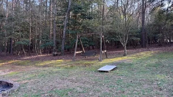 a view of a park with swings