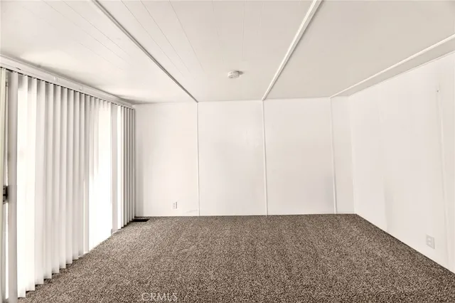 a view of a room with windows