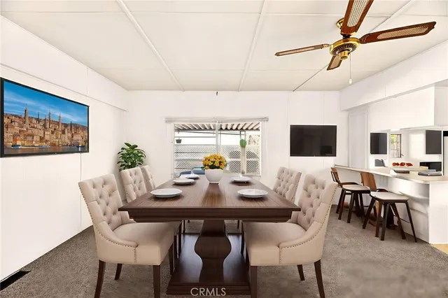 a view of livingroom with furniture and a window