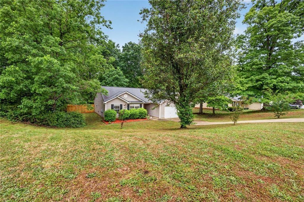 466 Raymond Drive Winder, GA 30680 - Photo 32 of 33 a view of an outdoor space and yard